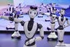 BEIJING, CHINA - AUGUST 18, 2023 - Humanoid robots perform a dance during the 2023 World Robot Conference in Beijing, China, August 18, 2023. In the first half of 2023, the output of China's industrial robots and service robots increased by 5.4% and 9.6%, respectively. (Photo credit should read CFOTO/Future Publishing via Getty Images)