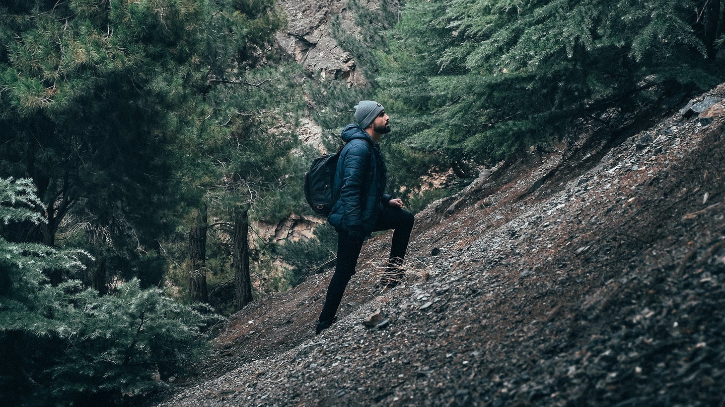 Person carefully hiking uphill