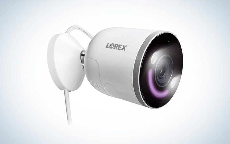 A Lorex 4K spotlight indoor/outdoor security camera on a blue and white background