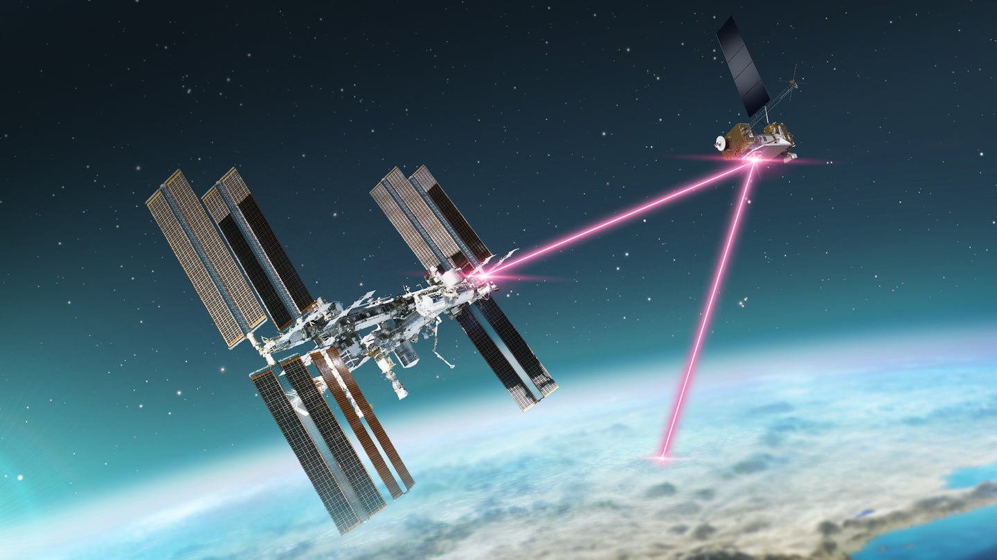 Illustration of laser communication satellite array and the ISS above Earth