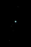 Distant photo of Uranus and its five moons