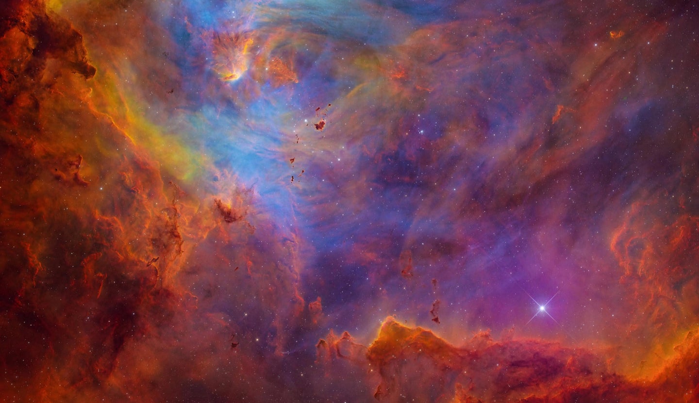 Iridescent Running Chicken Nebula with glowing gases and stars