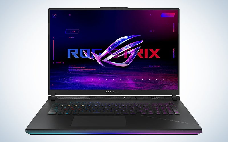 The Asus ROG Strix SCAR G834JY on a blue and white background