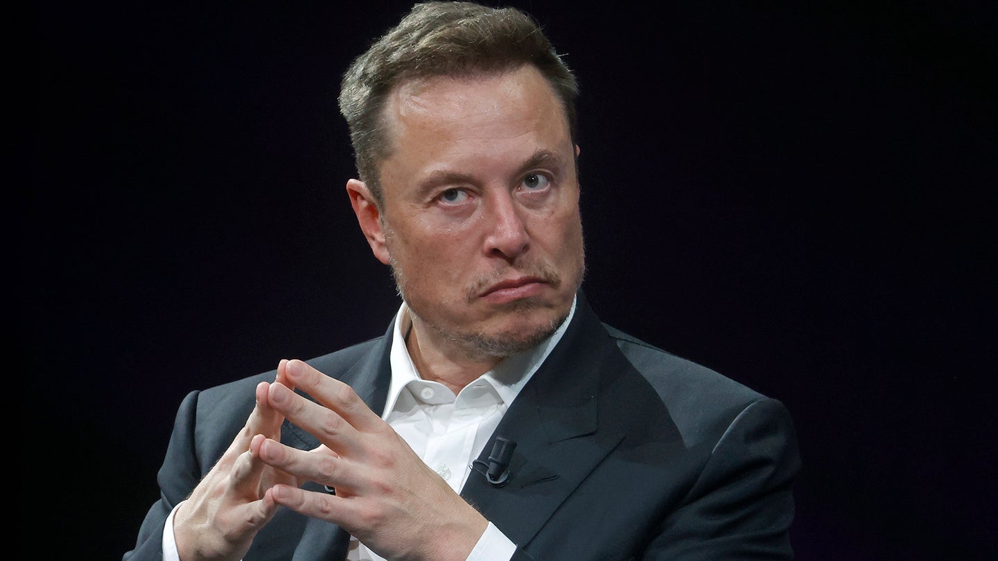 Elon Musk in suit