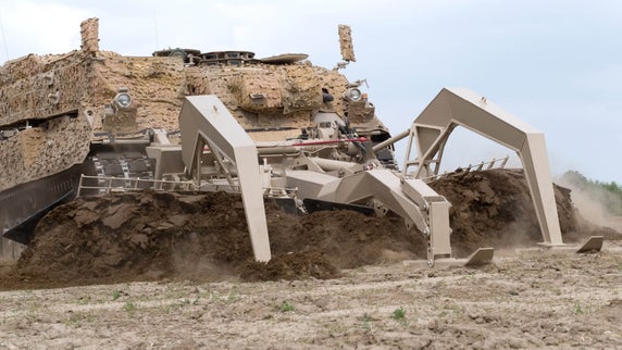 This massive armored vehicle has a giant plow for clearing Russian mines