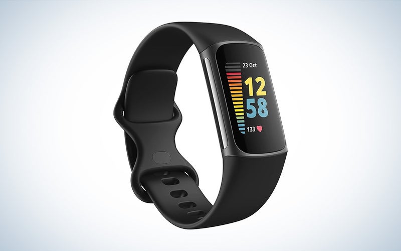 The Fitbit Charge 5 cheap fitness tracker with a black band against a white background