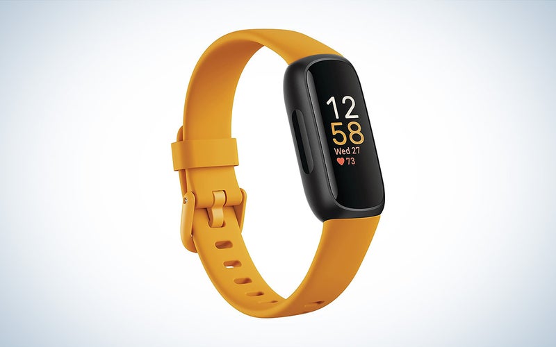 The Fitbit Inspire 3 cheap fitness tracker with an orange band against a white background