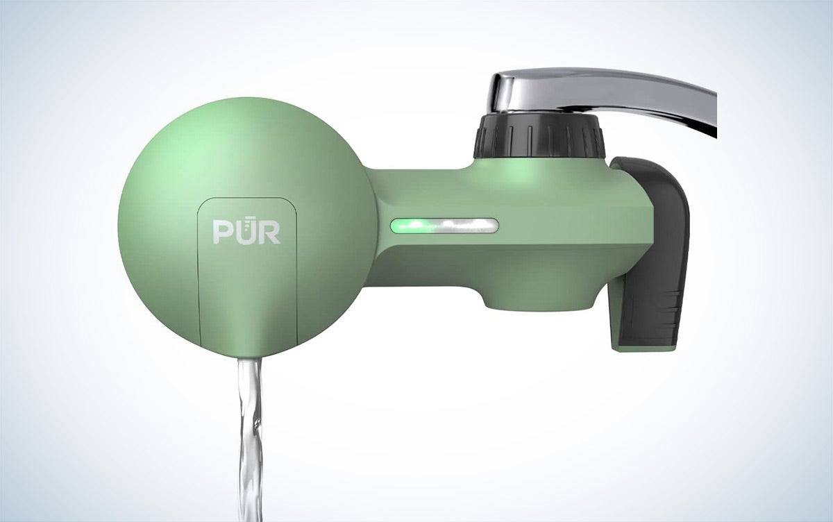 A green PUR PLUS Faucet Mount Water Filtration System
