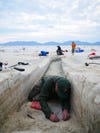 Researchers digging in the lakebed with the White Sands human footprint archaeological site