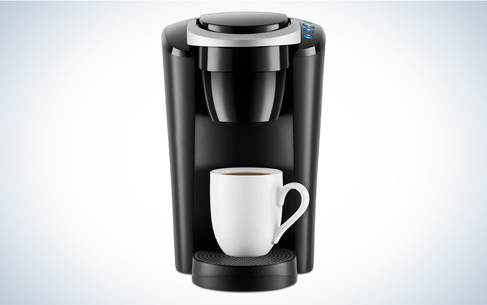 A Keurig K-Compact Single-Serve K-Cup Pod Coffee Maker, Black, on a blue and white background