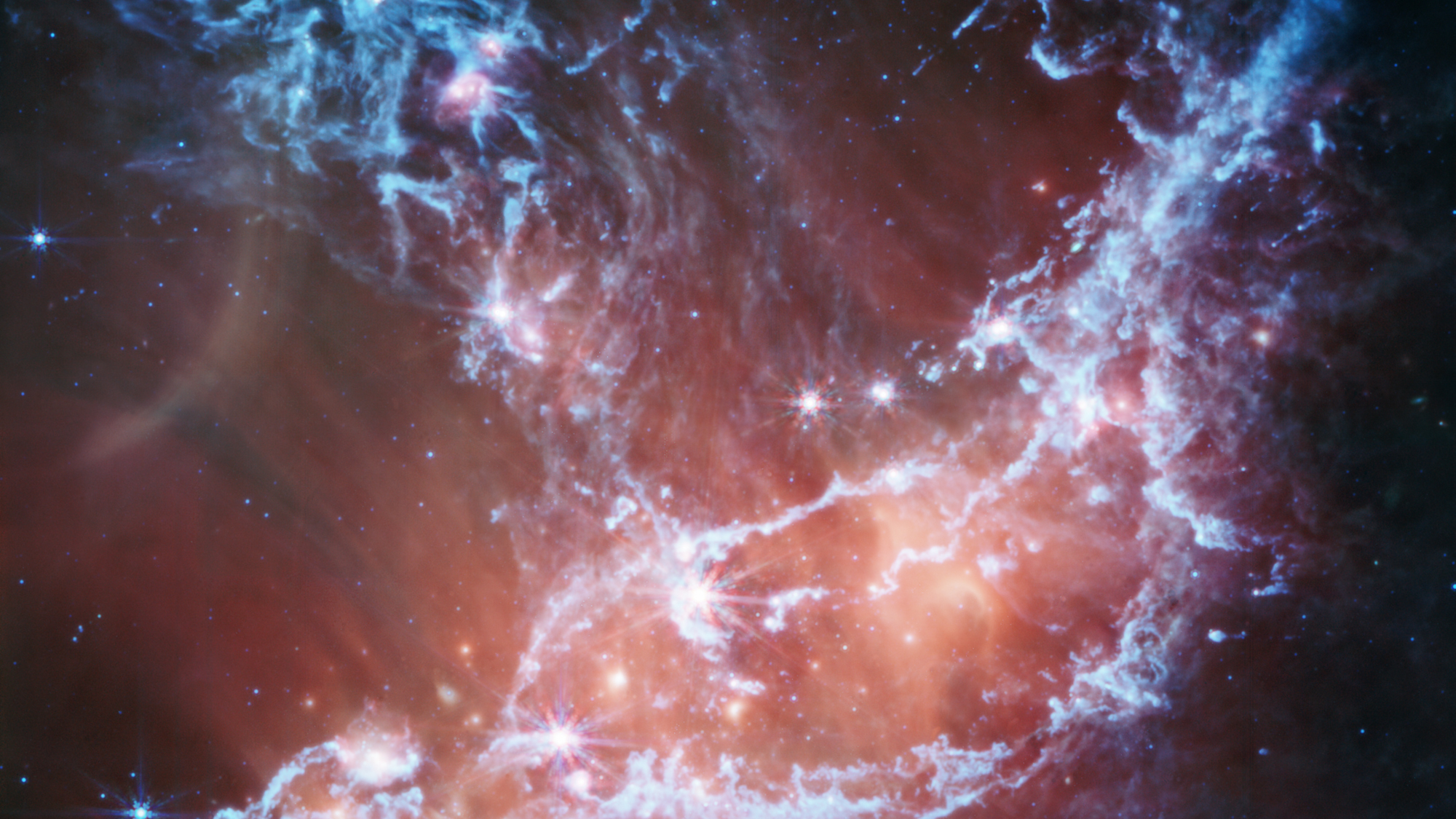 Star-making hot spot looks like a glowing raven in new JWST image