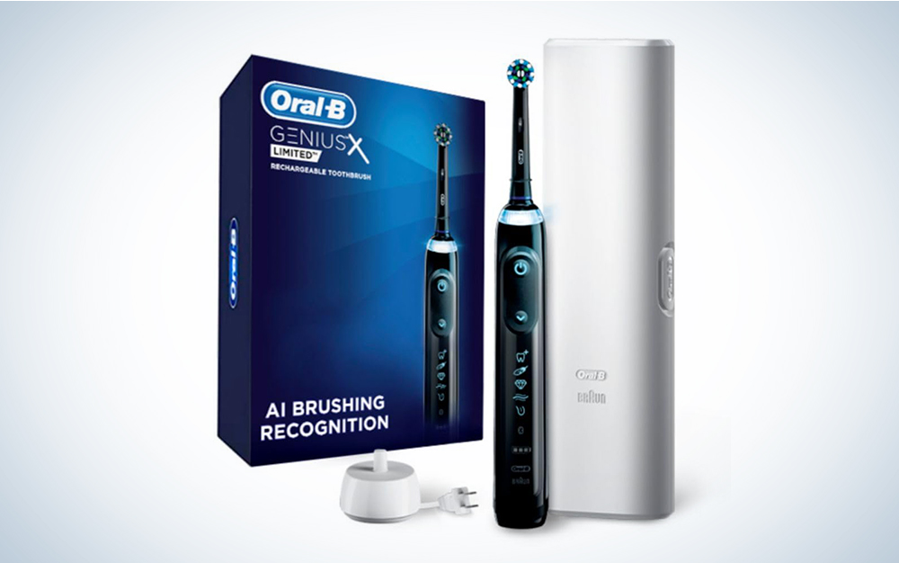 An Oral-B toothbrush on a blue and white background