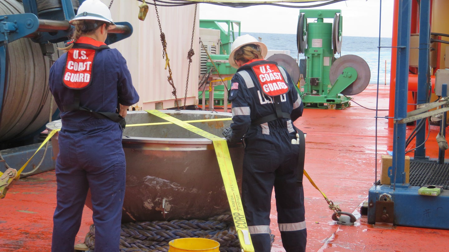 Two US Coast Guard officials handling remains of OceanGate Titan submersible