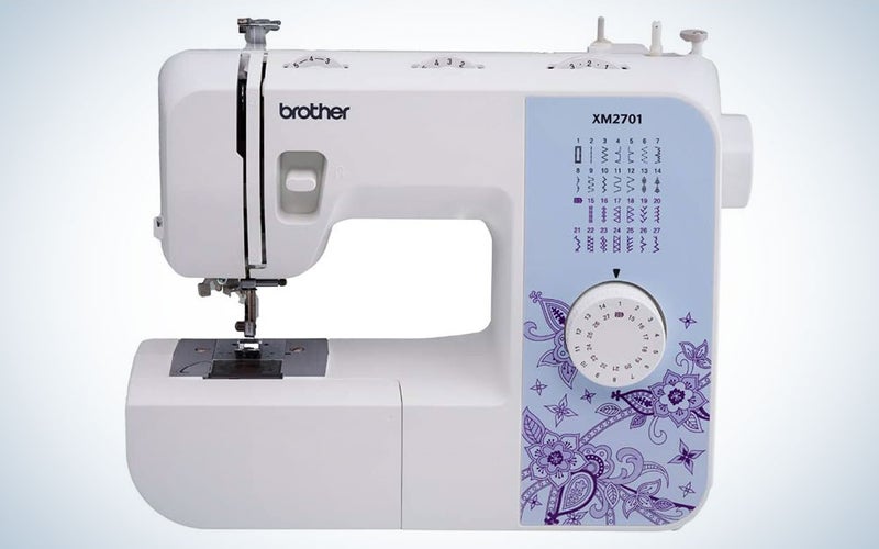 A Brother XM2701 Sewing Machine on a blue and white background