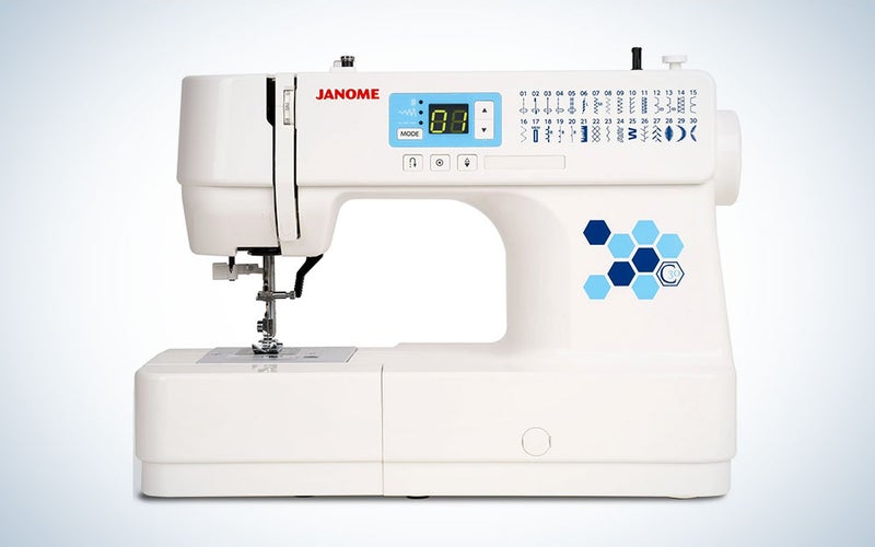 A Janome C30 Sewing Machine on a blue and white background