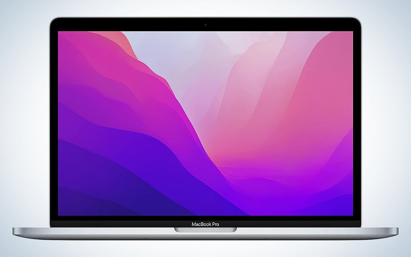 A 2022 13-inch Macbook Pro on a blue and white background