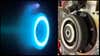 A pair of thrusters, one with an electric blue glow.