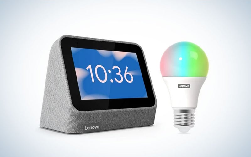 A Lenovo Smart Clock on a blue and white gradient background