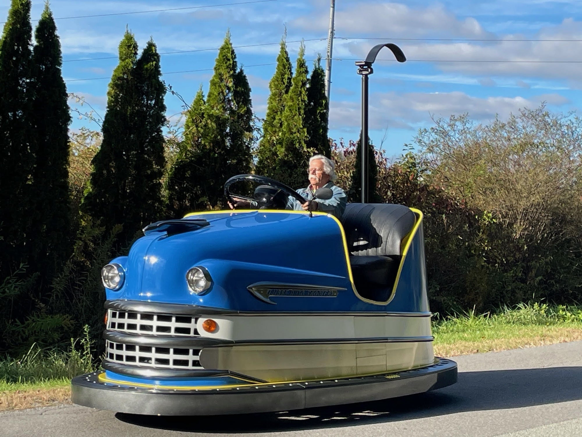 a giant bumper car on the road