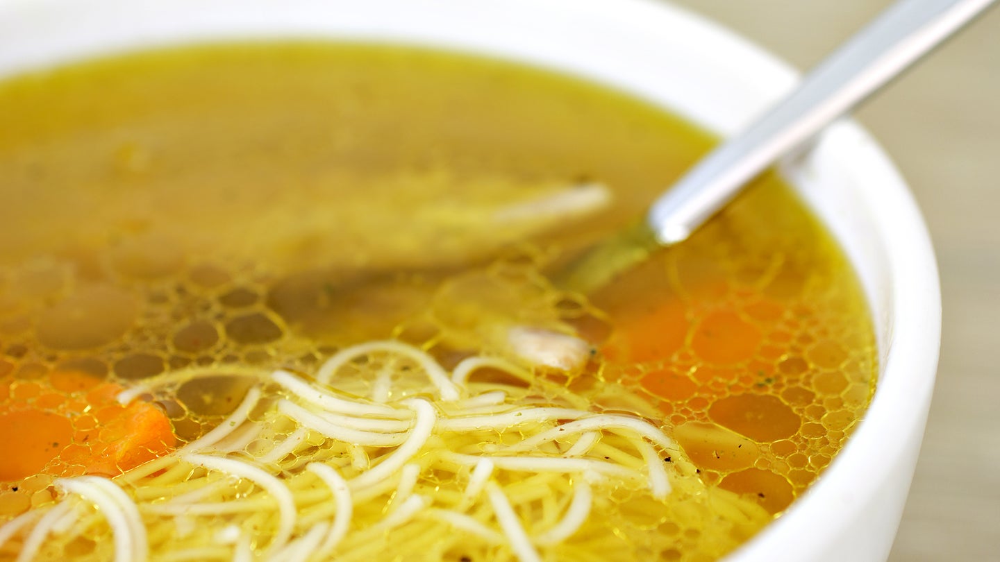 A bowl of chicken soup typically contains protein, vegetables and soothing broth.