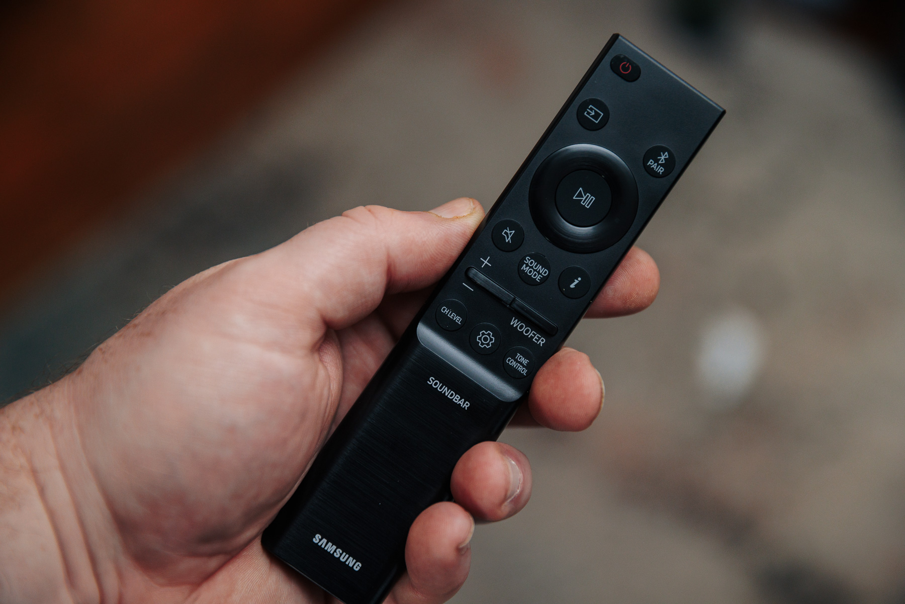 Samsung Q900C remote in a left hand