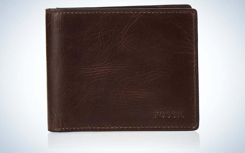A dark brown leather Derrick Men's Wallet by Fossil on a plain background.