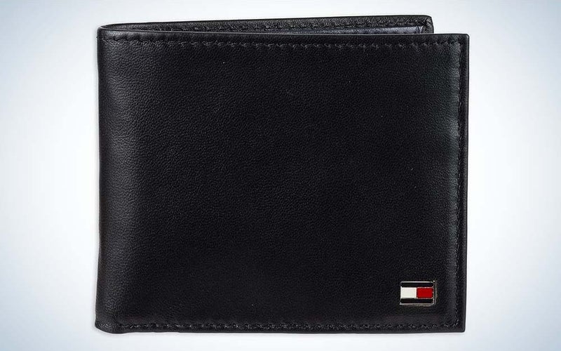 A black version of the Tommy Hilfiger Men's Passcase Wallet against a plain background.