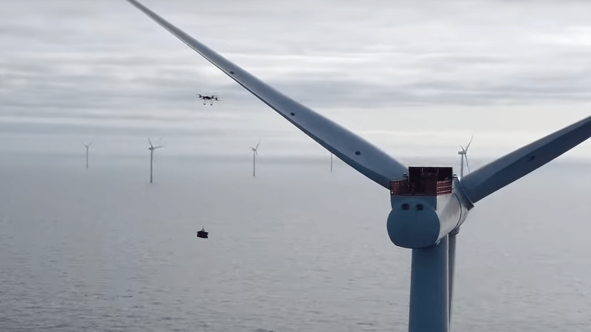 Watch a heavy-lifting drone land a perfect delivery on an offshore wind turbine