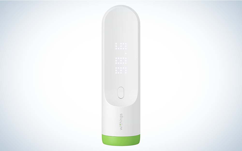 A white Withings Thermo Smart Digital Thermometer with a green ring around the bottom against a plain background.