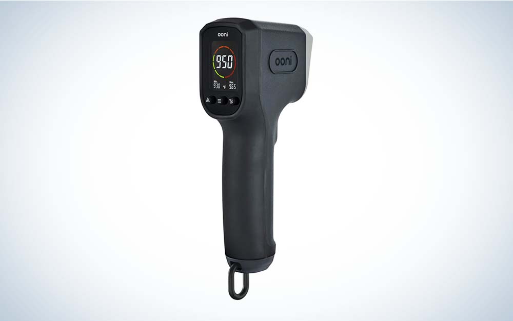A black Ooni Infrared Digital Thermometer with an LCD display against a plain background.
