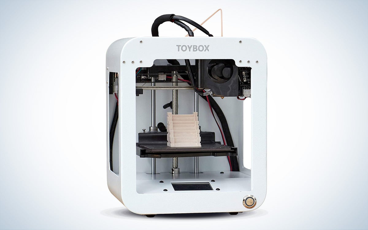 The white Toybox 3D Printer for Kids is placed against a white background with a gray gradient.