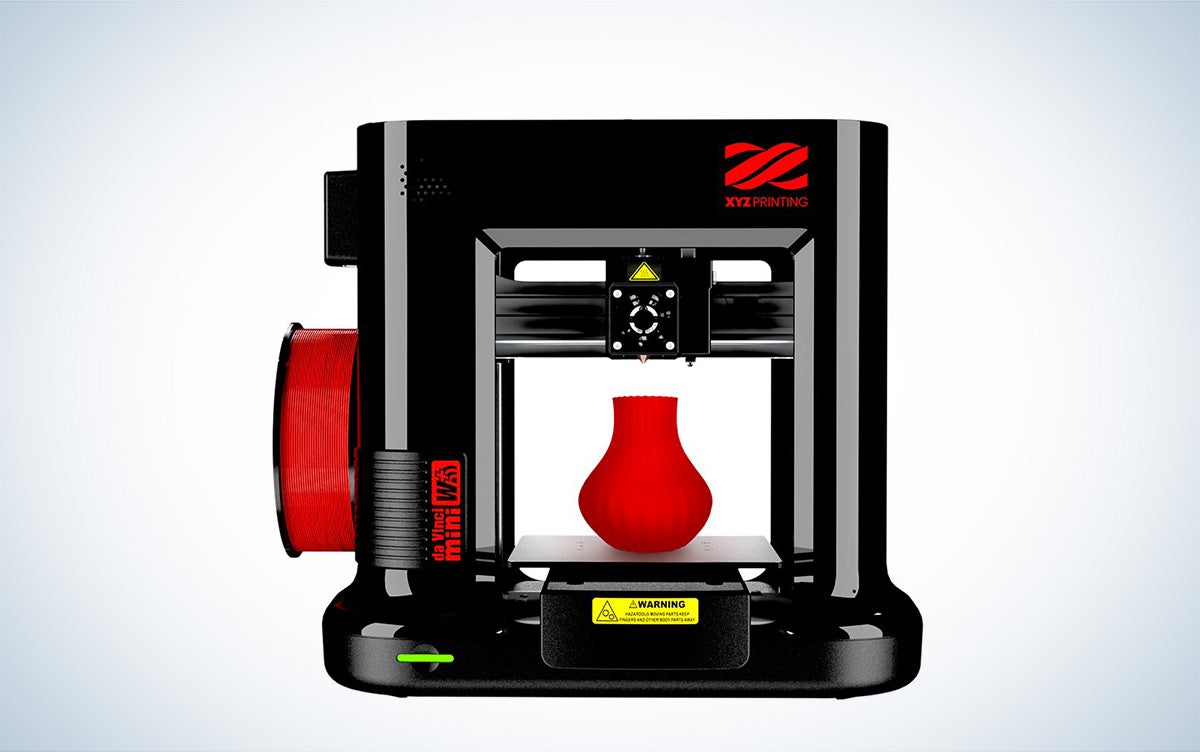 The black and red XYZprinting Da Vinci Mini Wireless 3D printer is places against a white background.