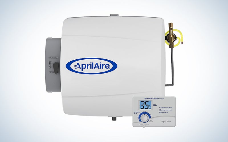 AprilAire 500 Whole House Humidifier over a white background with a gradient