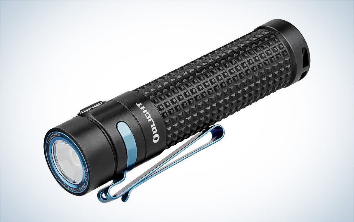 The black OLIGHT S2R II rechargeable flashlight is placed against a white background.