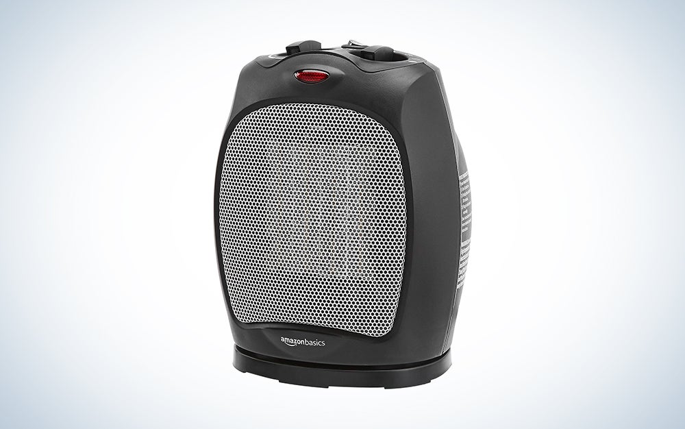 black Amazon Basics Oscillating Ceramic Heater over a white background with gradient