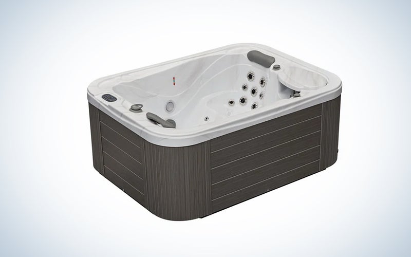 Luxury Spas WS-595 hot tub over a background with a gradient