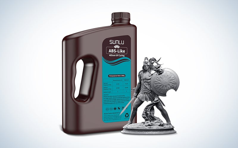 Sunlu ABS-Like Resin (3000G) bottle with a silver warrior figure in front over a white background