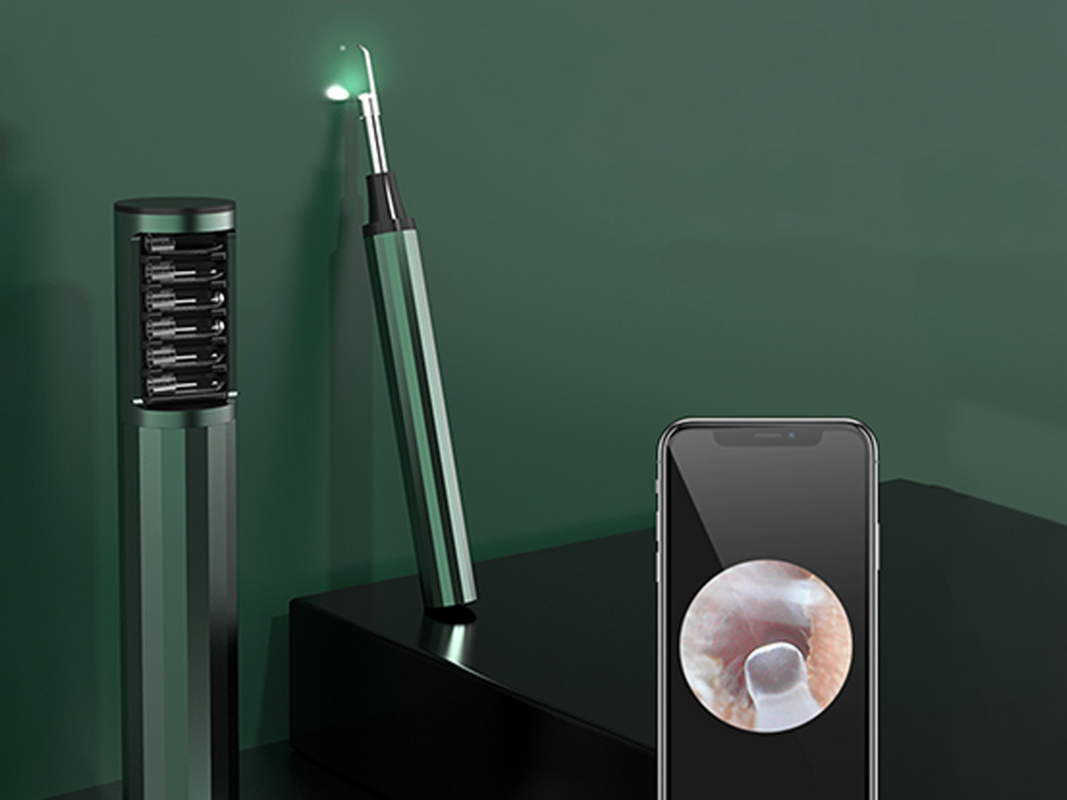 A visual earwax cleaner on a green background