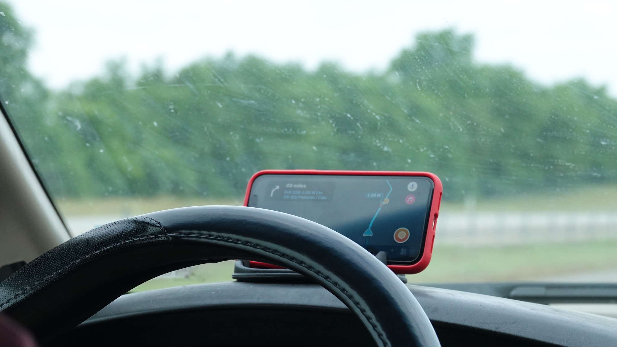 waze app on phone on car dashboard
