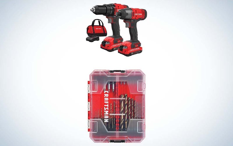 A red cordless drill, impact driver, and carrying bag over a drill bit set in a red case.