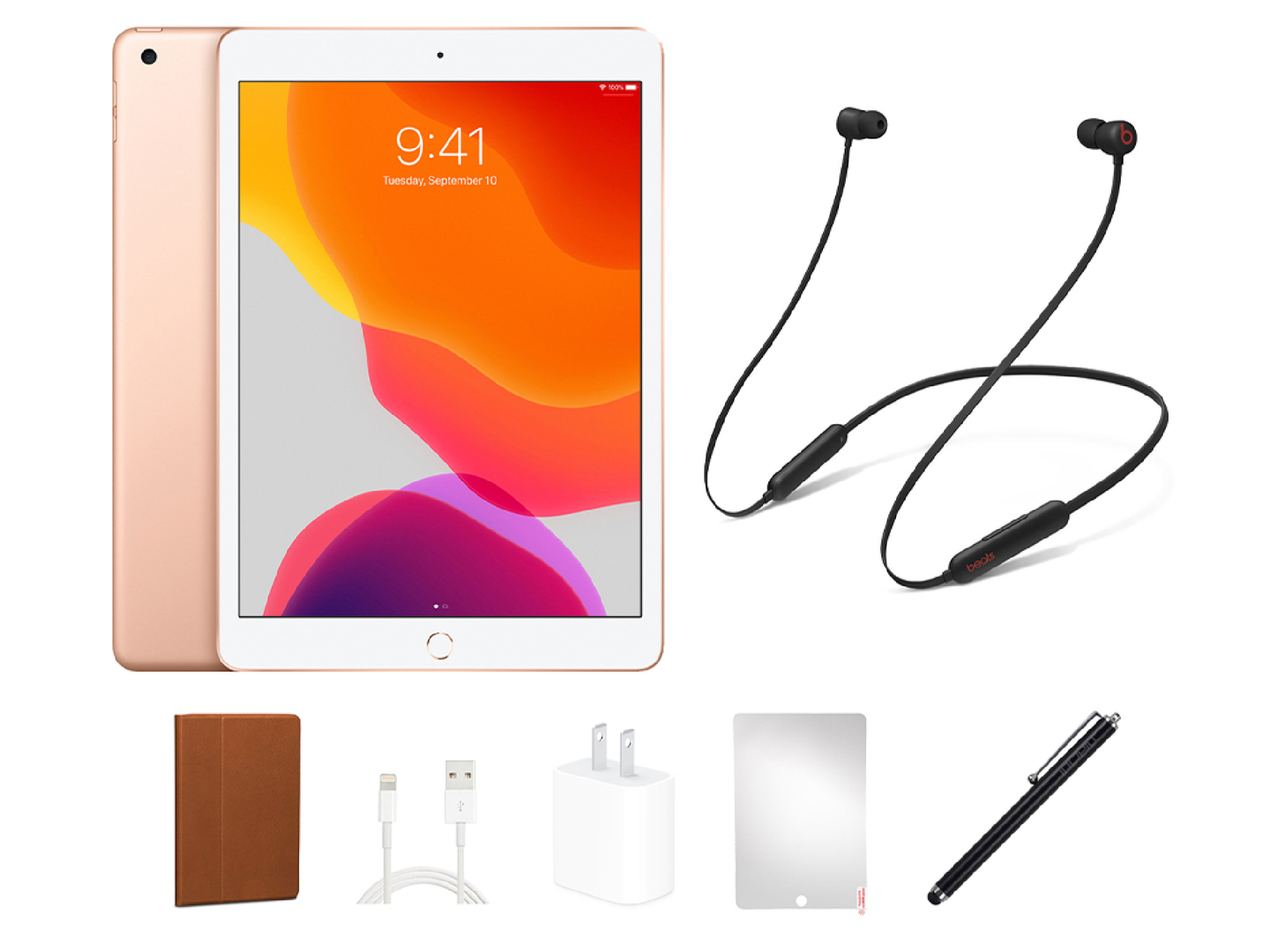 An iPad, a pair of Beats wireless headphones, and other iPad accessories on a plain background