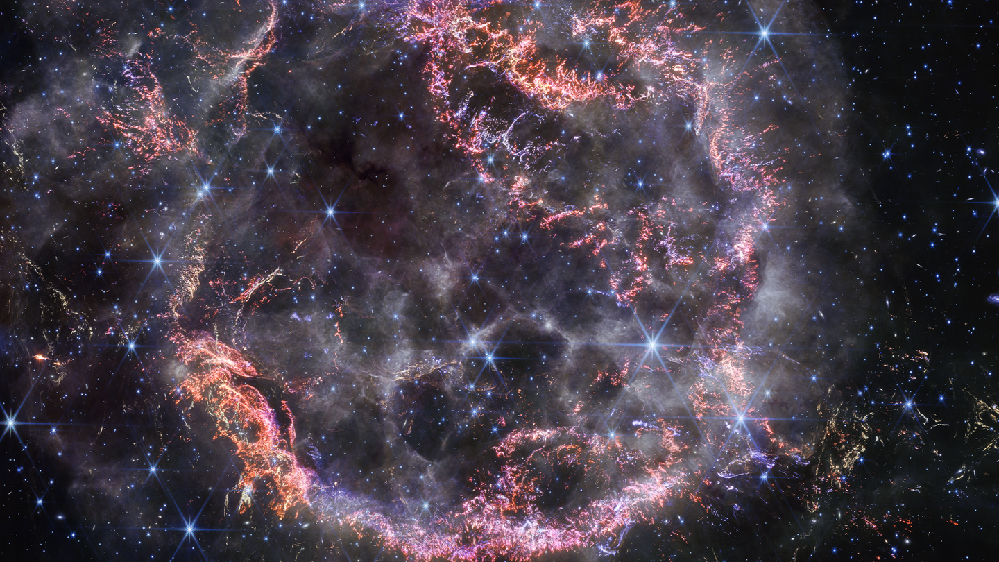 A new high-definition image from NASA’s James Webb Space Telescope’s NIRCam unveils intricate details of supernova remnant Cassiopeia A and shows the expanding shell of material slamming into the gas shed by the star before it exploded.