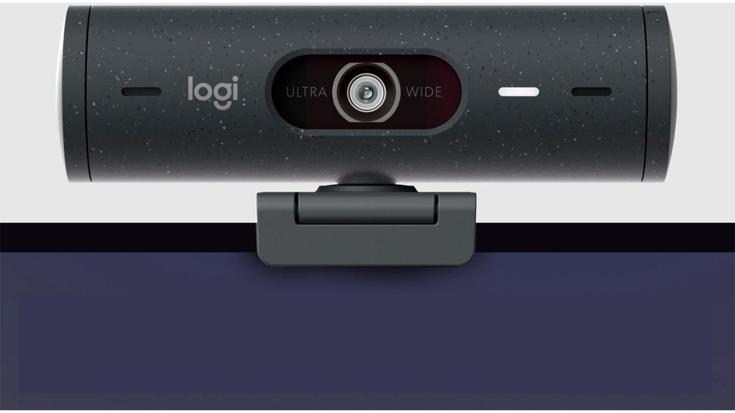 Logitech Logi webcam attached to the top of a monitor
