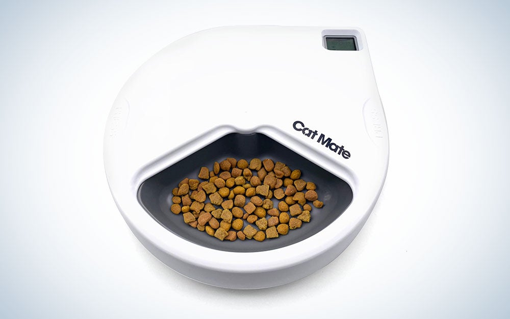 A white Cat Mate automatic cat feeder on a plain background.