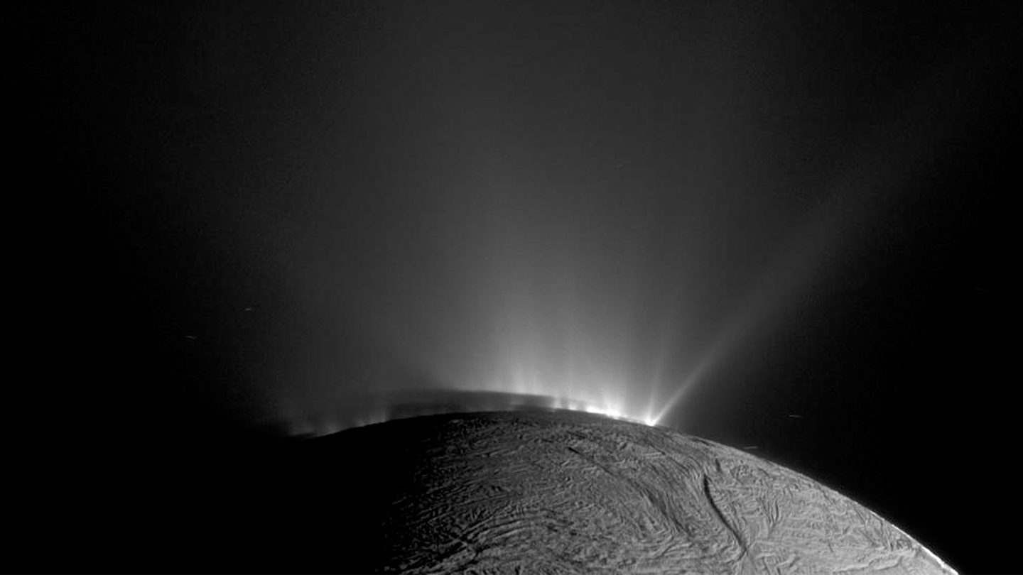 A 2010 image captured by NASA’s Cassini spacecraft shows water from the subsurface ocean of Saturn’s moon Enceladus spraying from huge fissures out into space. The spacecraft sampled icy particles and scientists are continuing to make new discoveries from the data.