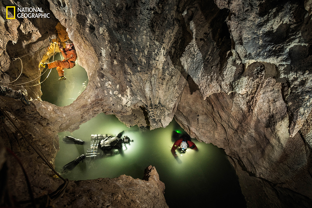 Caver Valentina Mariani (above), National Geographic Explorer Kenny Broad (center), and Nadir Quarta prepare for a dive into the dark, toxic waters of Lago Verde. Such sunlight-starved ecosystems could offer a glimpse into the chemistry of life in alien seas. (CREDIT: National Geographic/Carsten Peter)