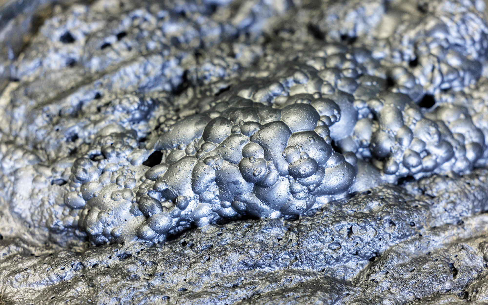 Recycled graphite attached to air bubbles at a graphite recycling laboratory in Freiberg, Germany.