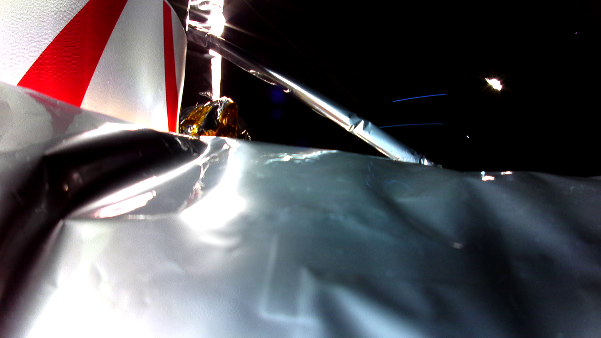 The first image from Peregrine in space. The camera is mounted atop a payload deck and shows Multi-Layer Insulation (MLI) in the foreground. 