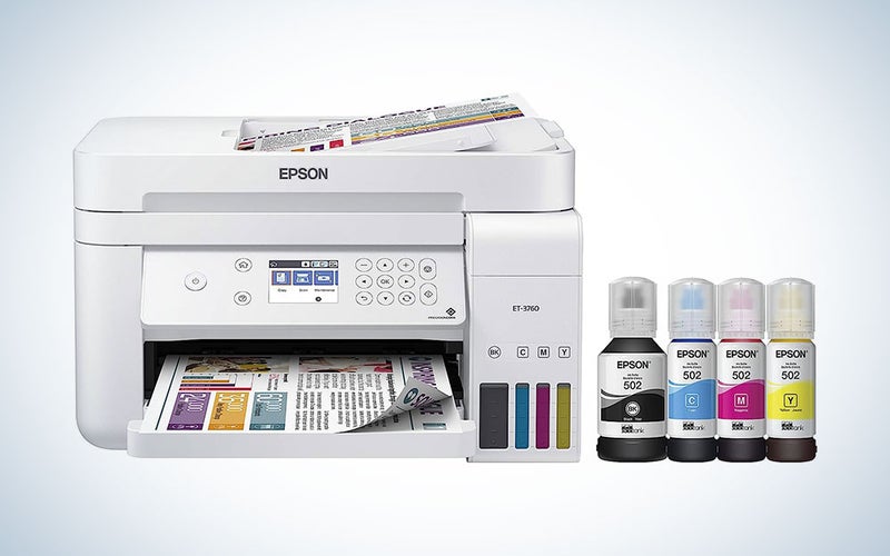A white Epson EcoTank ET-3760 AirPrint printer with four bottles of printer ink on a plain background.