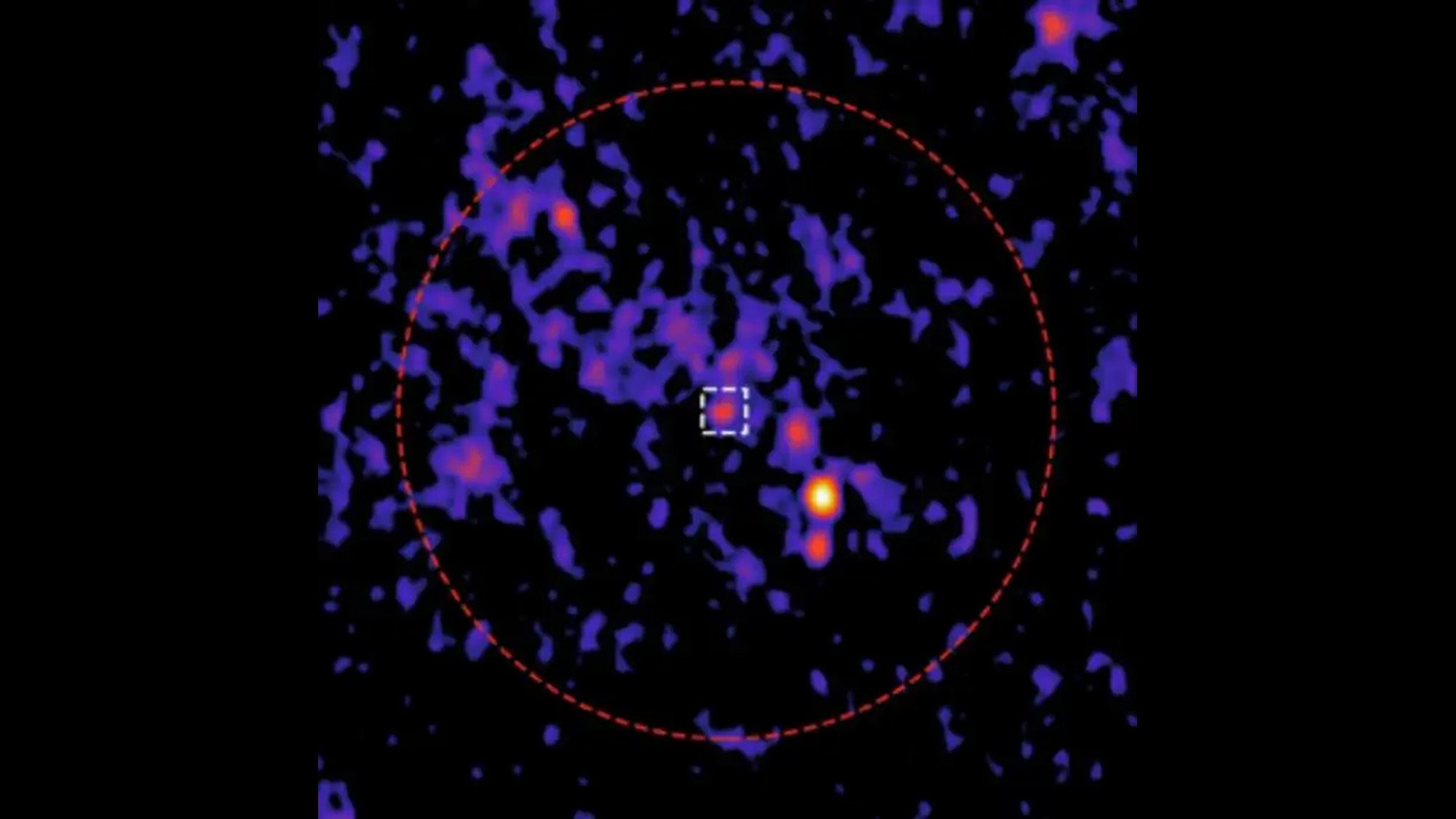 A team of astronomers identified a new radio source (white square) in the center of globular cluster 47 Tucanae (red circle).